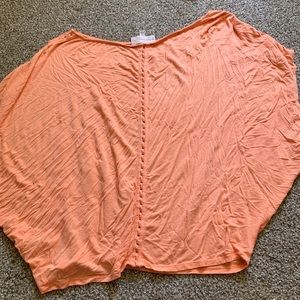 Peach flowy shirt with knotted accents